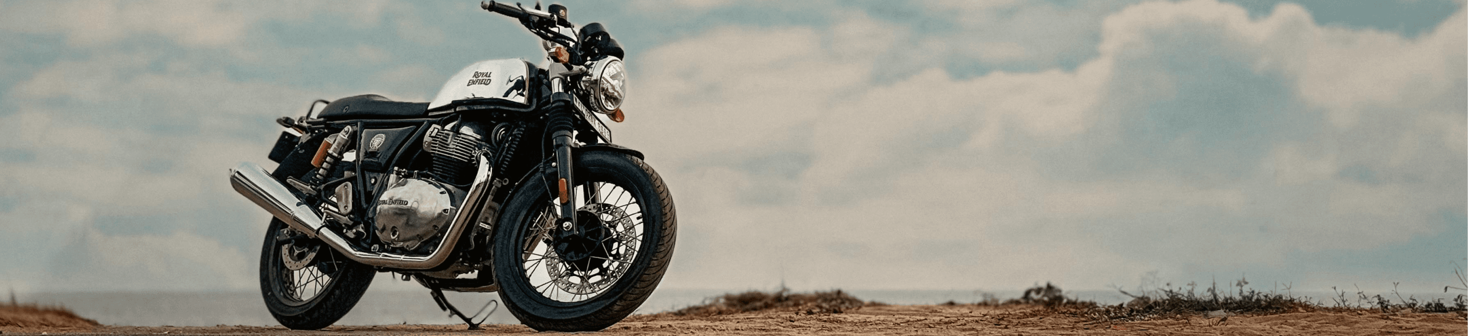 Royal Enfield motorcycle overlooking the coastline